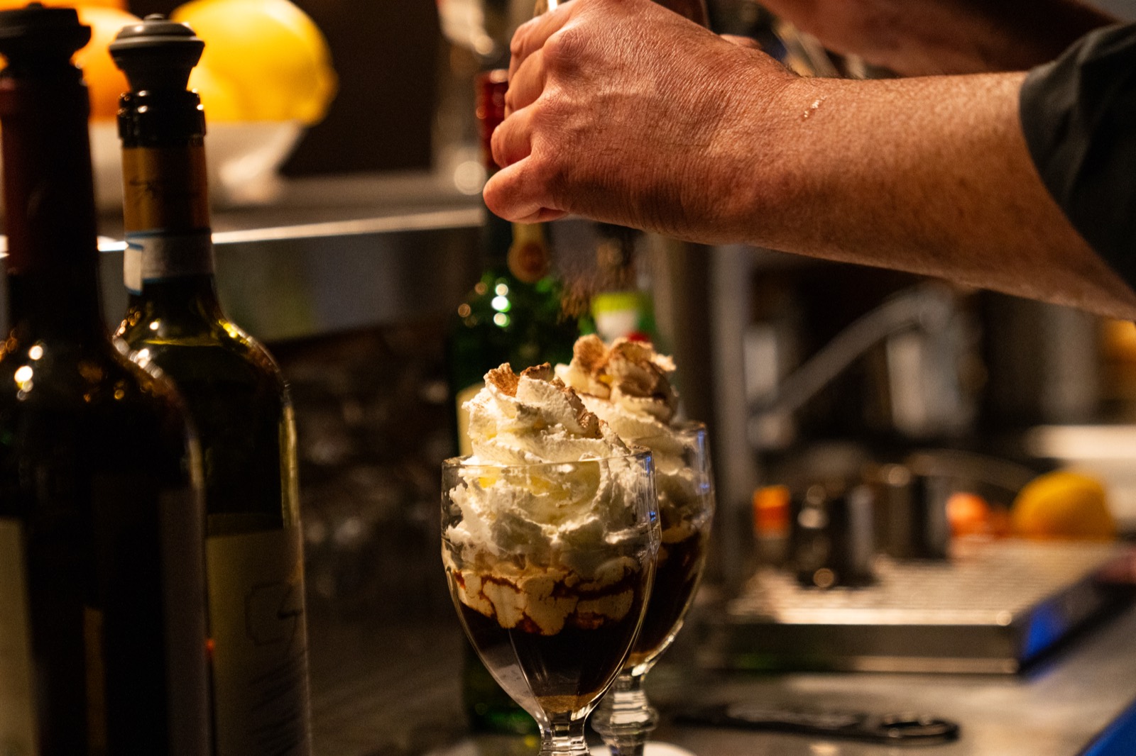 A dessert finished to order at the pass.